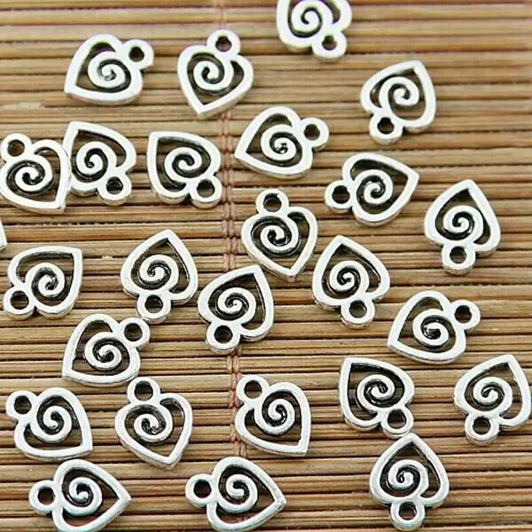 

100pcs 9.5*7.4mm hole 1.5mm Tibetan silver swirl heart charms EF1694