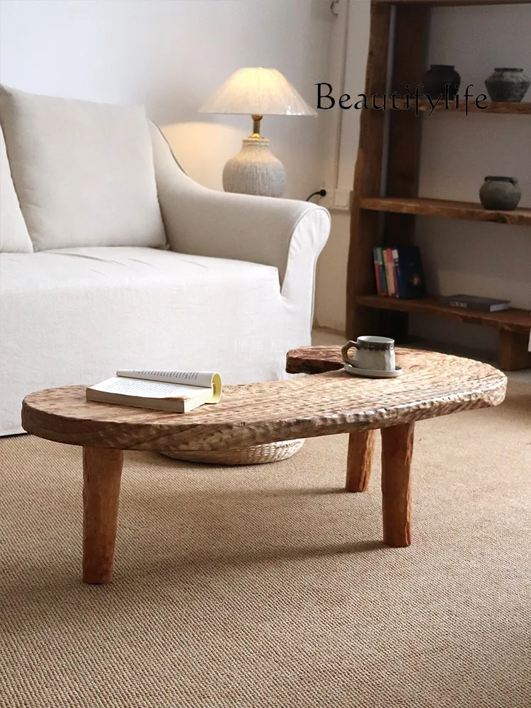 

Special-shaped all-solid wood coffee table, low table, tatami designer, medieval high-end sense, fashionable and simple