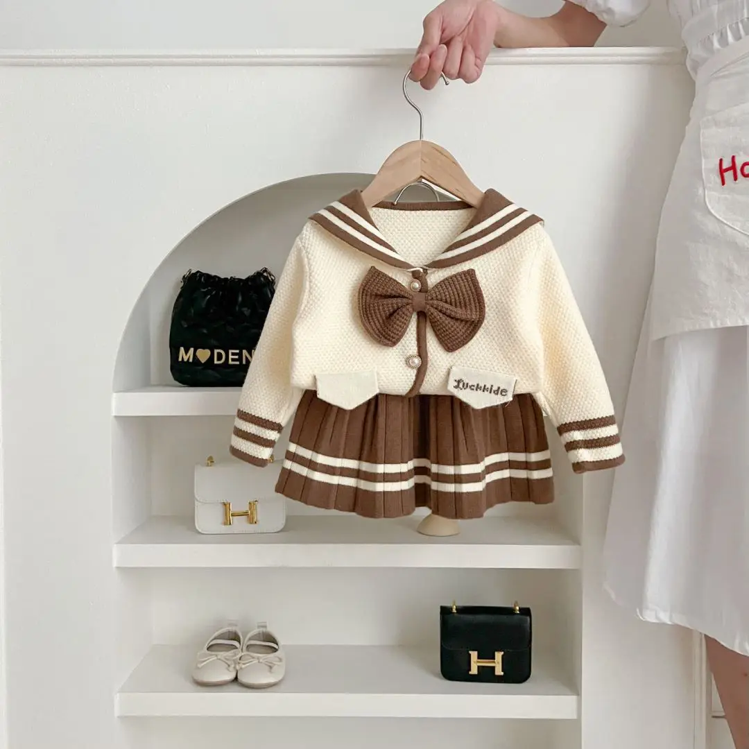 جديد ملابس الأطفال دعوى طفل الفتيات نمط Preppy سترة + التنانير 2 قطعة مجموعات الاطفال القوس الحياكة البلوفرات الفتيات البلوز معطف