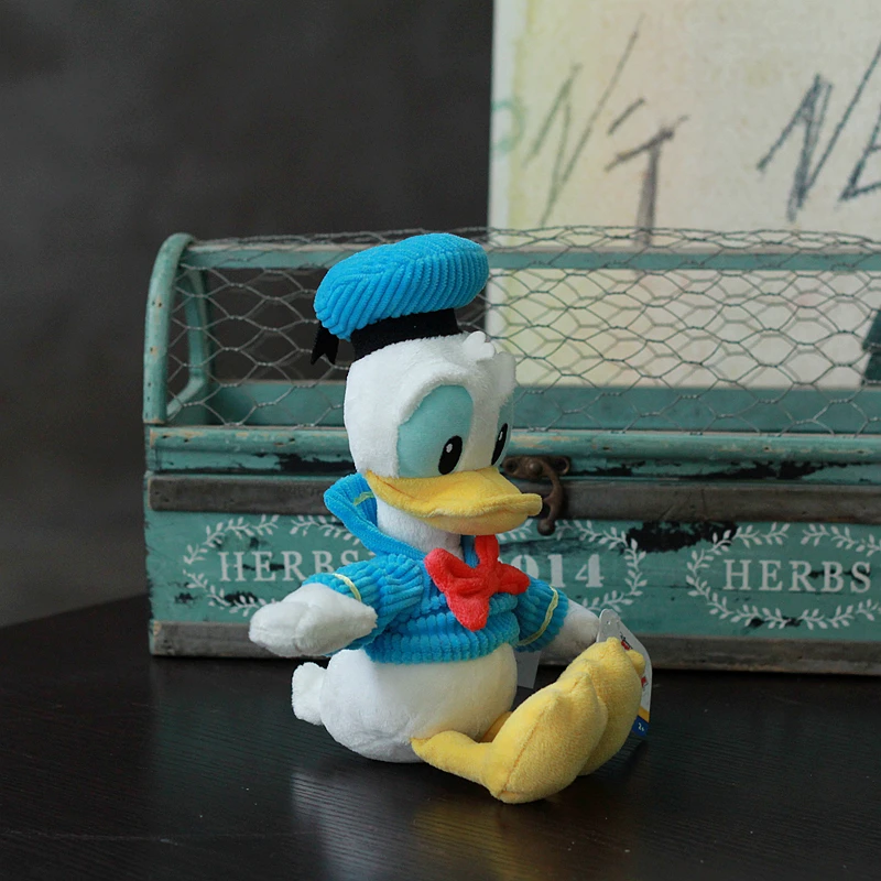 

Classic Donald Duck figurine - Donald doll with plush clothing and hat as a gift for a close friend or classmate