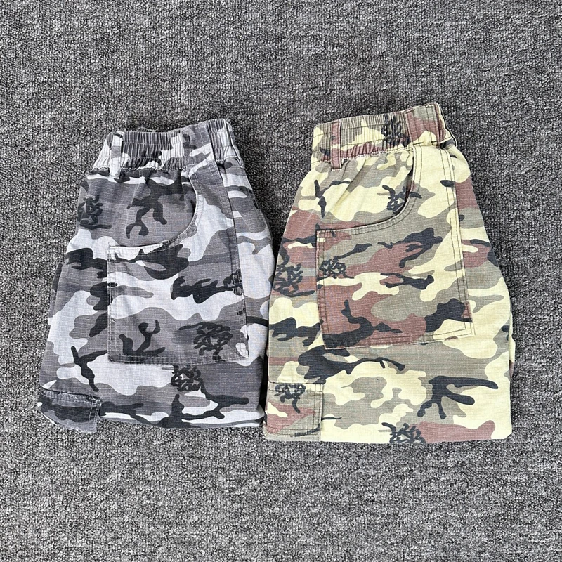 Foto Real High Street mono clásico con estampado de camuflaje pantalones cortos Mertra ropa de calle americana pantalones de chándal informales sueltos para hombres