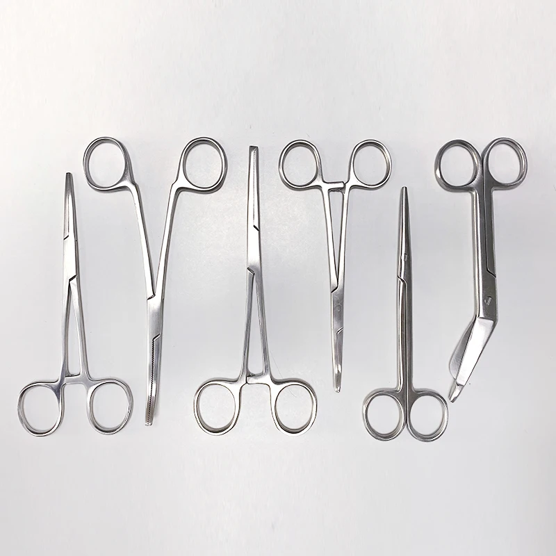 

Autoclavable Stainless Steel Box Including 11 Instruments Piler Scissor Forceps Probe Scalpel Hand