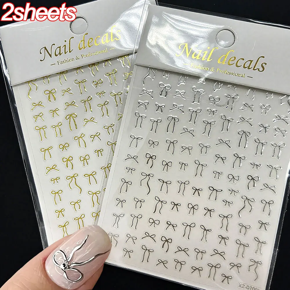 2 Stück 3D Bronzing Gold + Silber Schleife Nail Art Aufkleber Niedliche Bowtie Band Nagelaufkleber 8*10 cm Glänzende Schleifen Selbstklebendes Nagelzubehör