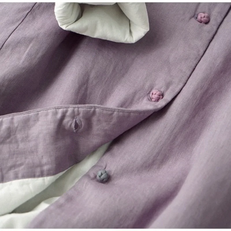 سترة نسائية شتوية طويلة جديدة لعام 2025 على الطراز الصيني بياقة واقفة وجيب بأزرار معطف نسائي سميك ملابس خارجية غير رسمية بأكمام طويلة