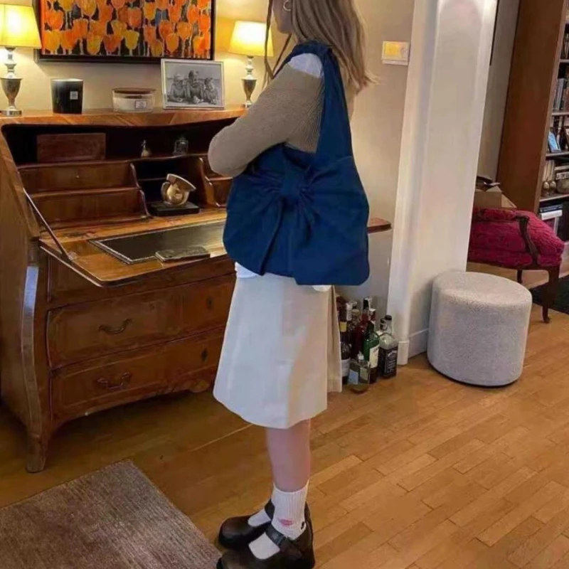 Borsa a tracolla in Denim con fiocco carino borsa a tracolla leggera Kawaii da viaggio per il tempo libero di nicchia di grande capacità per le donne