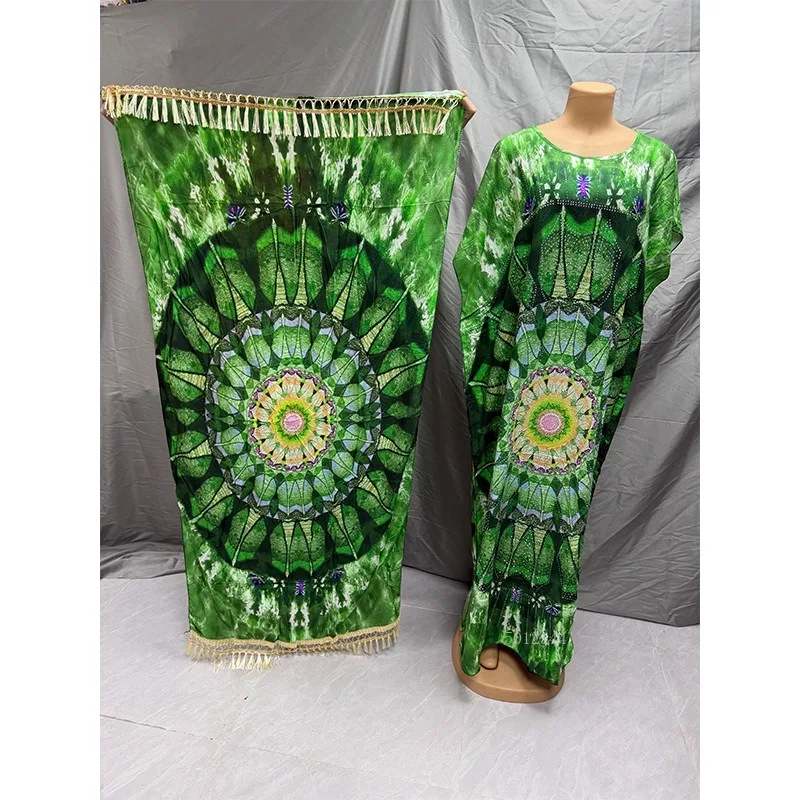 2026 Modieuze Afrikaanse vrouwen jurk rayon positionering hot boren afdrukken losse strand jumpsuit lange jurk groot formaat gewaad