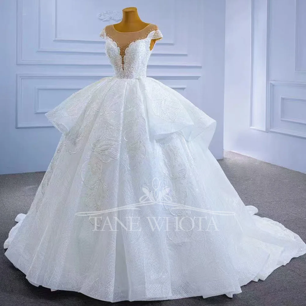 高級レースウェディングドレス 2025 Oネック キャップスリーブ レースアップバック ビーズ装飾 ボールガウン カスタマイズ可能 ノイバ ベスティド・デ・カサメント