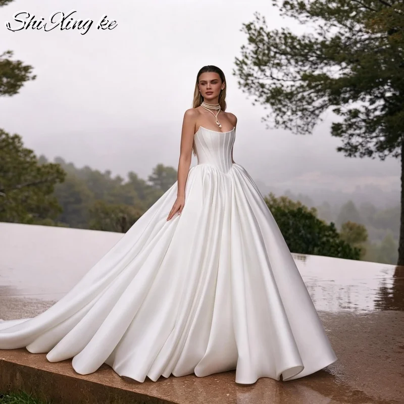 2026 Sweetheart Strapless Satin Wedding Dress Cathedral Train Pockets Lace‑up Back Bridal Gown Vestidos De Novia Customized