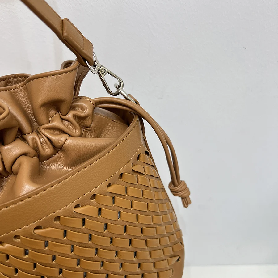 Summer Korea new fashion drawstring bucket bag woven hollow out ladies shoulder crossbody bag female pu leather purse handbags