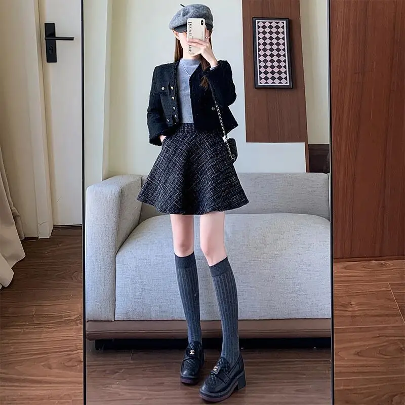 Geruite rok Dames Hoge taille Minimalistisch Modieus Kantoorkleding Veelzijdige rok Broek Herfst Winter Korte rok Leuke nieuwe stijl