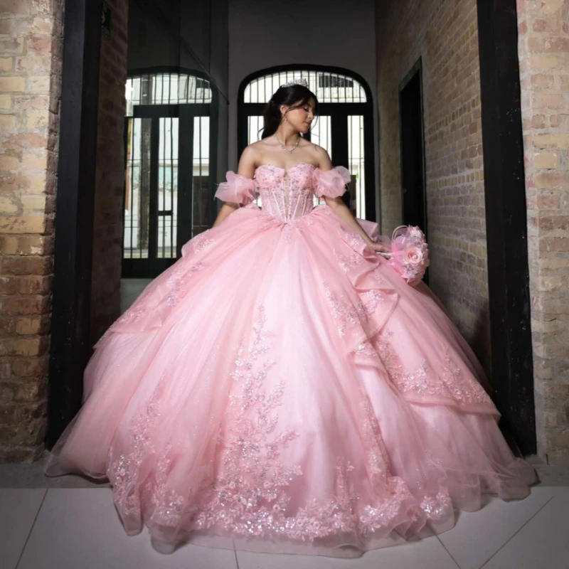 

Light Pink Shiny Ball Gown Quinceanera Dresses Applique Lace Beading Crystal Bow Tiered Tull Corset Off The Shoulder Sweet 16 Dr