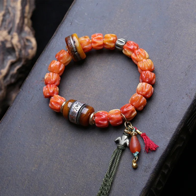 bracciale-reflux-semi-lucido-e-passion-seed-anello-singolo-in-osso-di-yak-con-perle-intarsiate-in-rame-perla-scorrevole