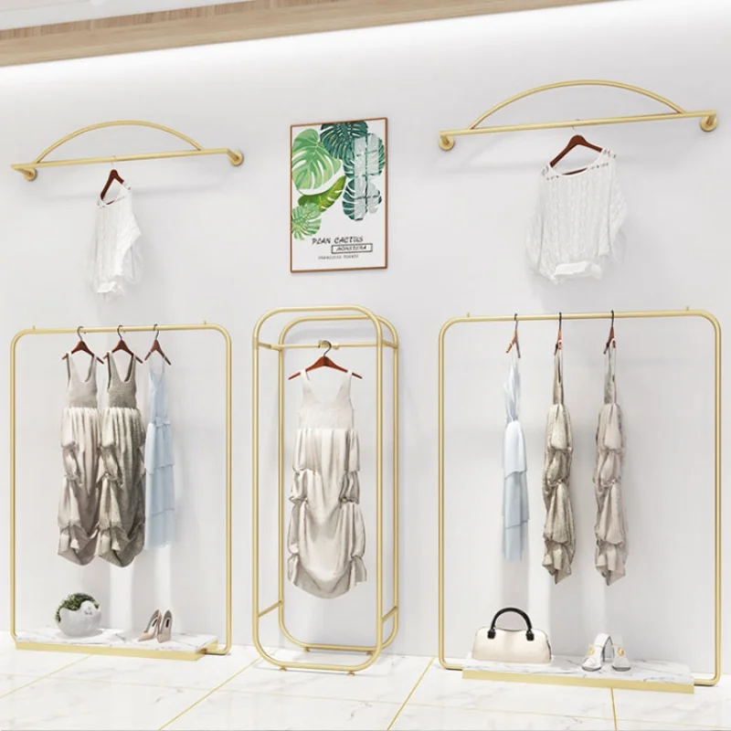 custom，Retail Clothing Store Interior Design Gold Garment Shelf Wall Mounted Clothing Display Racks