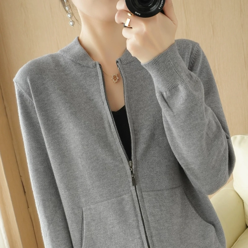 New cashmere sweater in autumn and winter women\'s stand collar solid color zipper cardigan long sleeve belt pocket strip versati