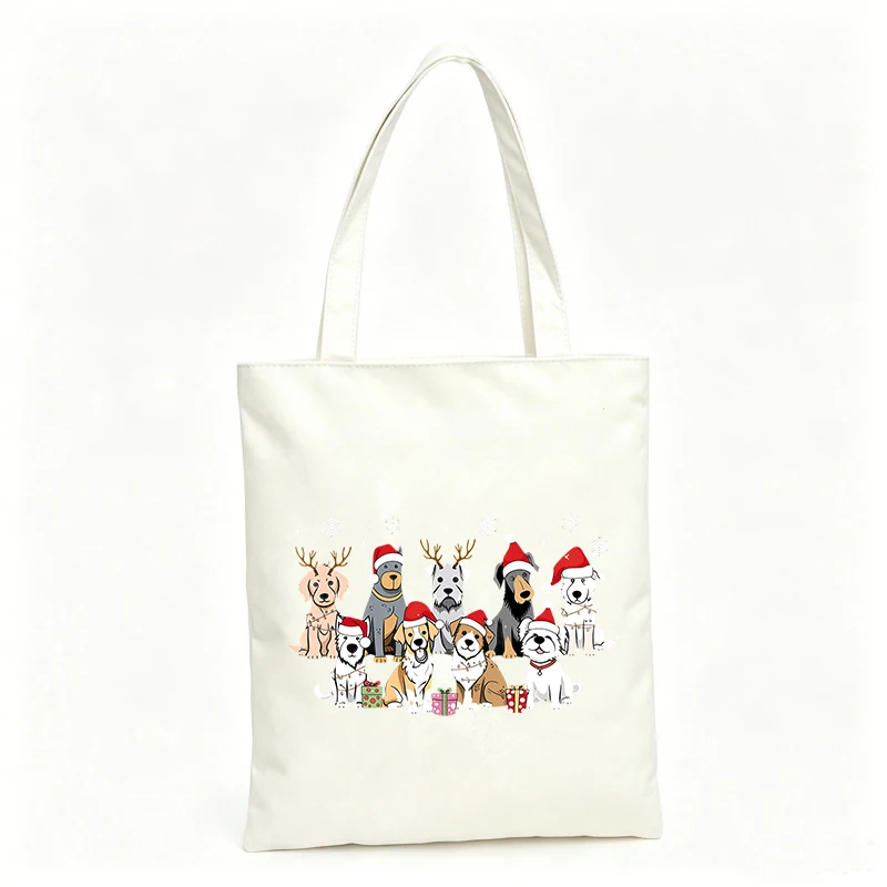 Women's canvas tote bag with dog and reindeer Christmas graphic, ideal for holiday shopping and casual outings