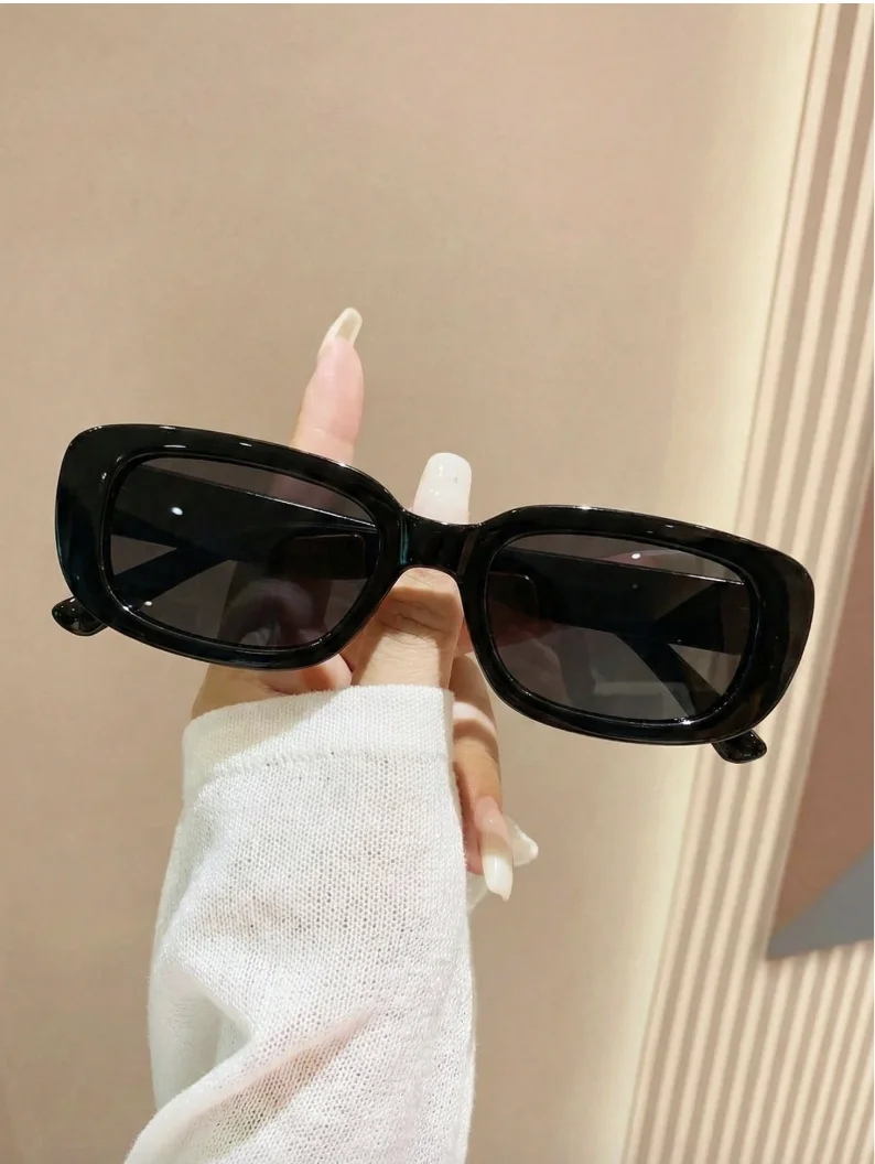 Unisex black rectangular sunglasses, suitable for travel, beach, bar, outdoor activities, and everyday casual wear