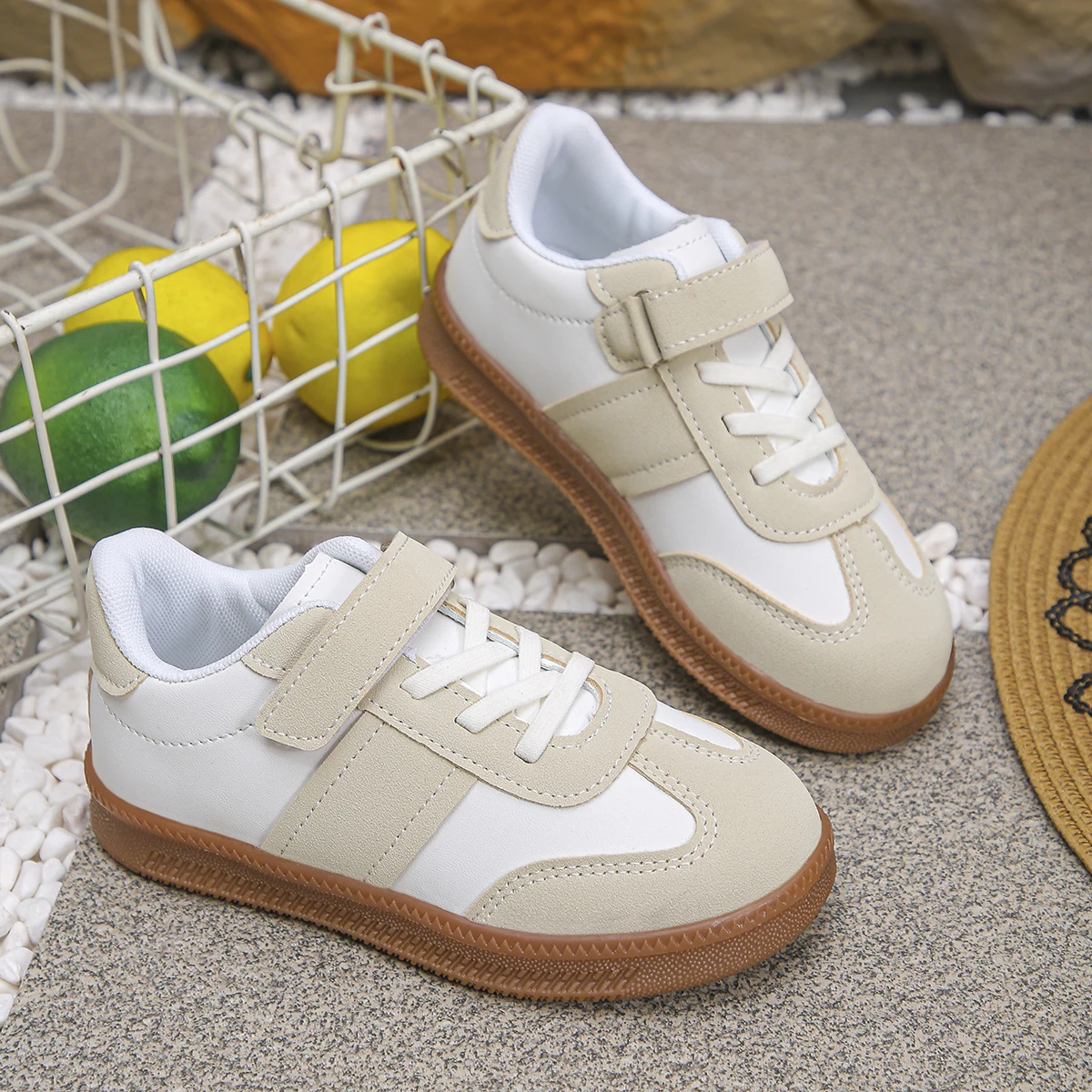 A Pair of Simple Color-Blocked Single-Button Sneakers for Boys and Girls for the Back-To-School Season