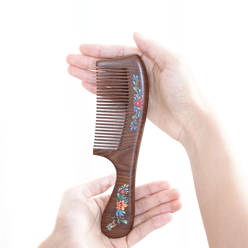 

Black sandalwood long-handled fine-tooth comb, anti-static and anti-knotting, specially designed for women.