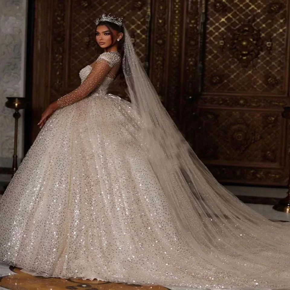 

On Zhu Customized Luxurious Sequin Shiny Beaded Crystal Wedding Dresses 2025 Long Sleeves O-Neck Court Train Tulle Bridal Gown