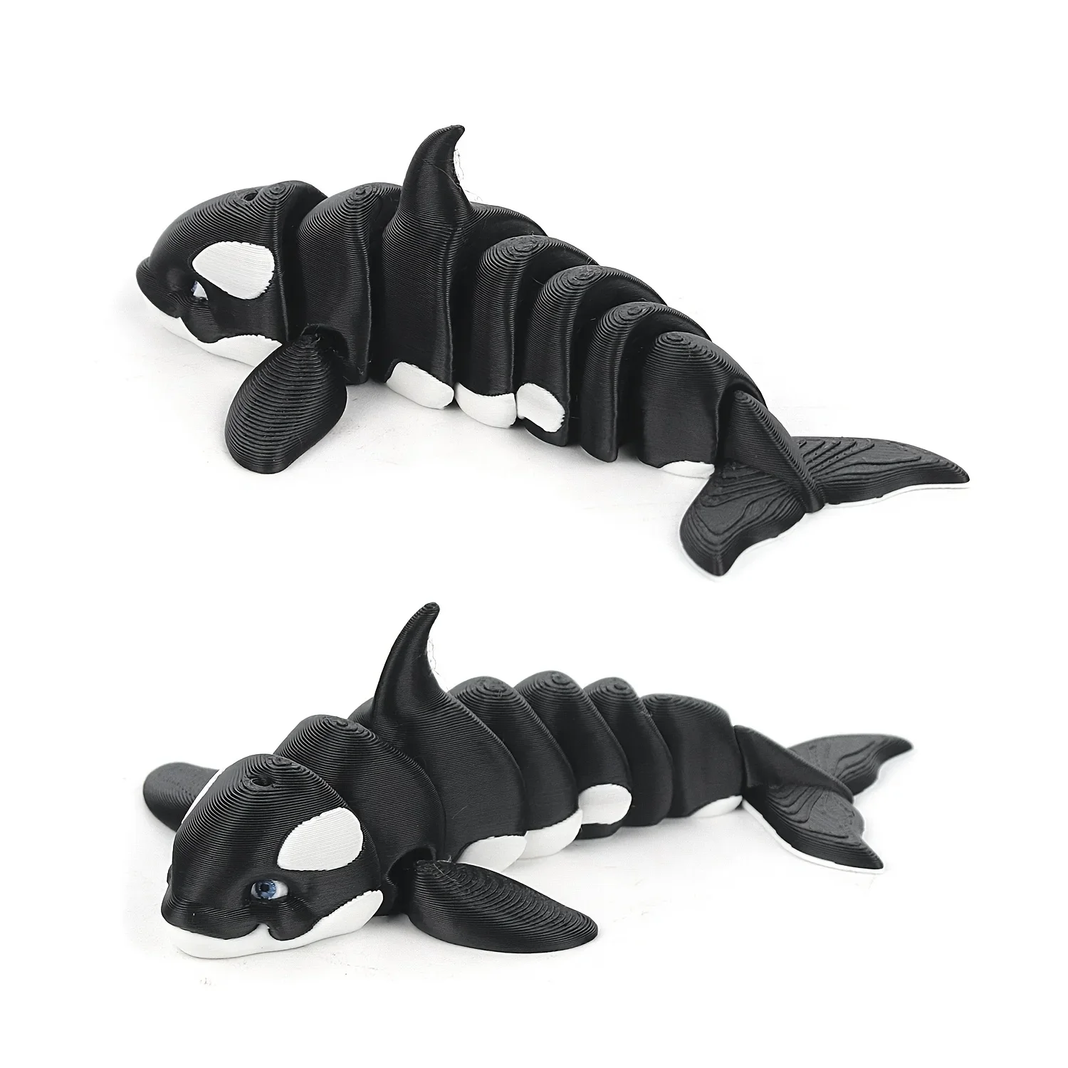 Juguete Orca impreso en 3D: una réplica realista de criaturas marinas, que sirve como modelo decorativo y juguete.