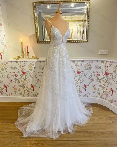 فساتين زفاف تول لامع 2026 مثيرة أشرطة سباغيتي بدون ظهر فساتين العروس على شكل حرف a بدون أكمام طويلة فستان حفلات الزفاف الحديث #4