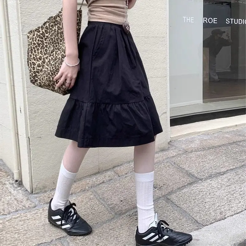 

2025 Новая винтажная черная мини-юбка трапециевидной формы женская Harajuku ретро с высокой талией облегающая карманная дизайнерская эластичная талия полуюбки