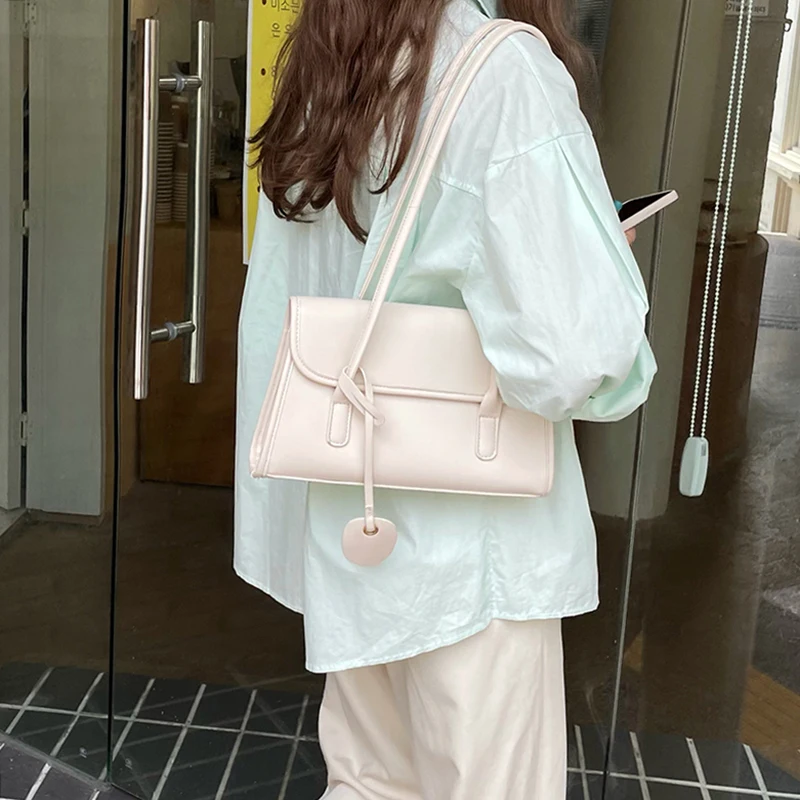 Yellow Shoulder Underarm Bag Women 2024 Spring/Summer New Fashionable French Texture PU Shoulder Bag Elegant pendants Handbag