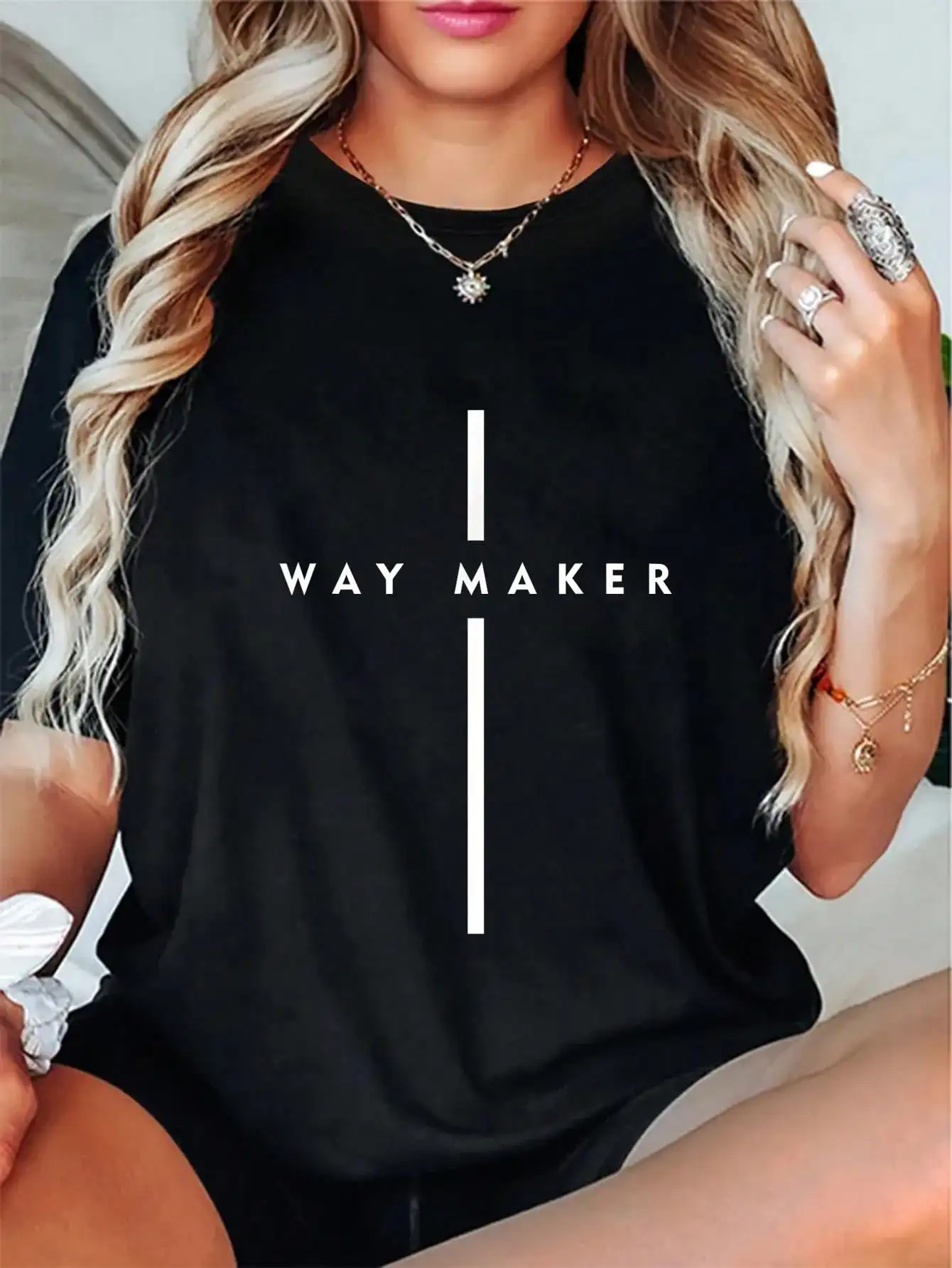

Black Loose Fit Graphic Tee with Vertical Line & Text Design