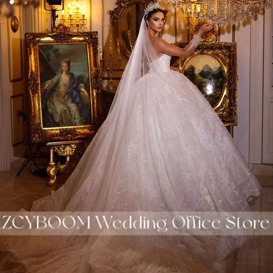 Squisito abito da ballo scintillante perline abiti da sposa con collo trasparente 2025 principessa illusione maniche lunghe abiti da sposa abiti da noiva