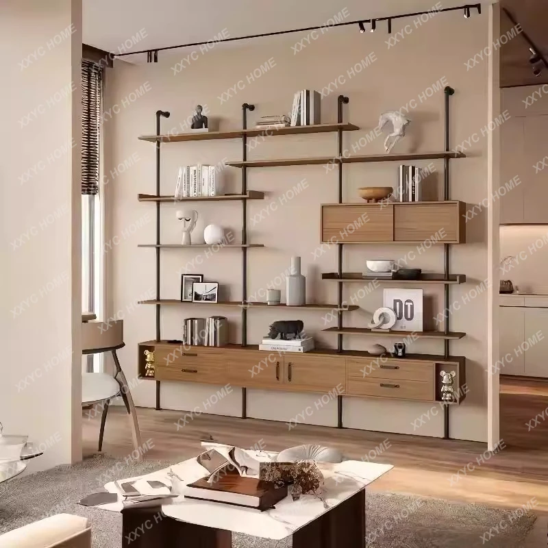Floor-to-ceiling solid wood shelves display wrought iron integrated storage living room bookcase