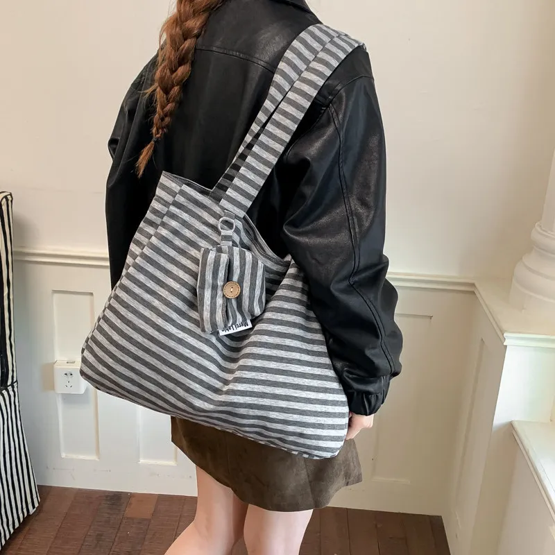 Korean-style, understated, and relaxed striped canvas tote bag for women2026New large-capacity, versatile commuter shoulder bag