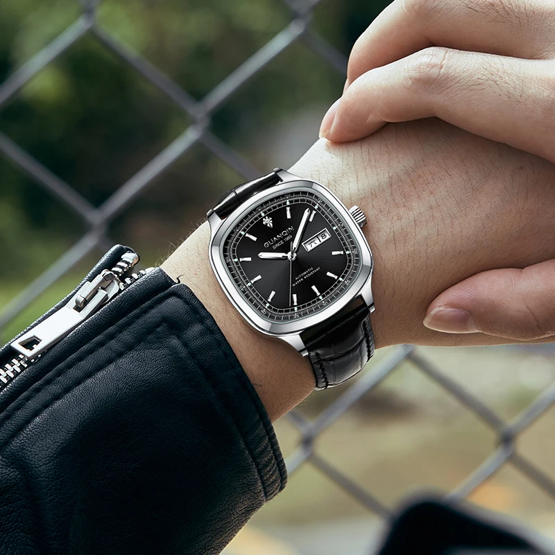 Guanqin นาฬิกากลไกสำหรับผู้ชาย, นาฬิกาหรูสมุดแพลนเนอร์นาฬิกาแซฟไฟร์นาฬิกาชายสายหนังกรอบเหล็กนาฬิกาเรืองแสงกันน้ำ