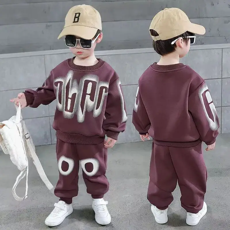 Wiosenny i jesienny zestaw odzieży dziecięcej 2025 Nowy luźny zestaw sportowy dla chłopców i dziewcząt Spodnie z kapturem Dwuczęściowy zestaw