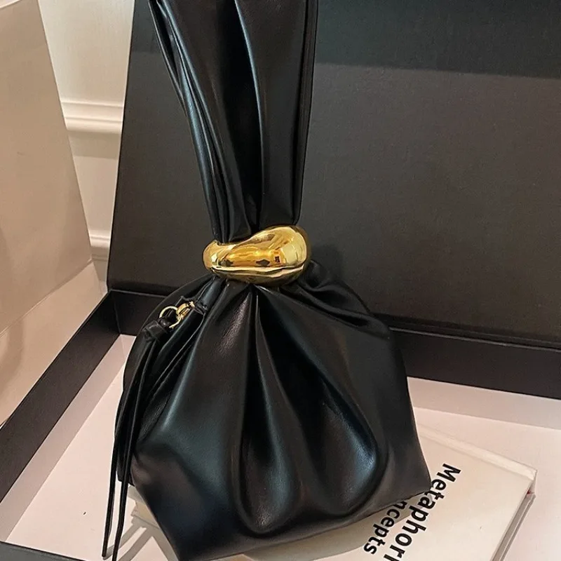 

Korean niche pleated cloud bag 2025 new retro fashion handbag female niche light luxury hand-held rice dumpling bag