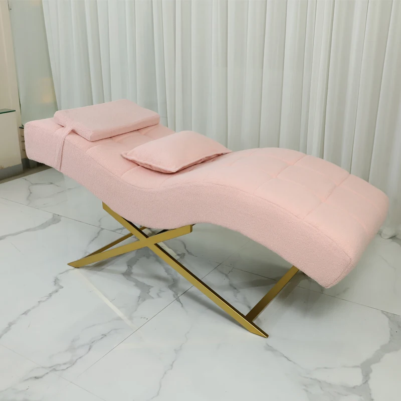 Modern pink beauty treatment table, stylish gold metal base design, suitable for eyebrow care, and body care services
