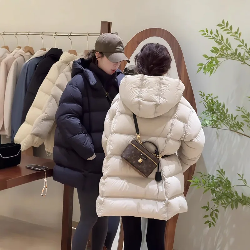 Nieuwe stijl 90% donsverdikte witte eend donsjack, Koreaanse stijl bladerdeegjas voor dames, halflang met capuchon donsjack dames