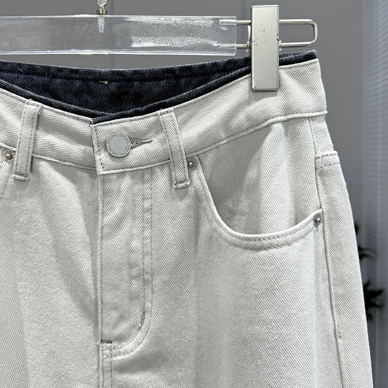 I nuovi jeans lavati casual a gamba larga dimagranti a vita medio-alta alla moda della primavera del 2025 per le donne