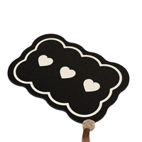 Black diatomaceous earth bathroom floor mat, quick drying toilet, absorbent carpet at the entrance of the bathroom, heart-shaped