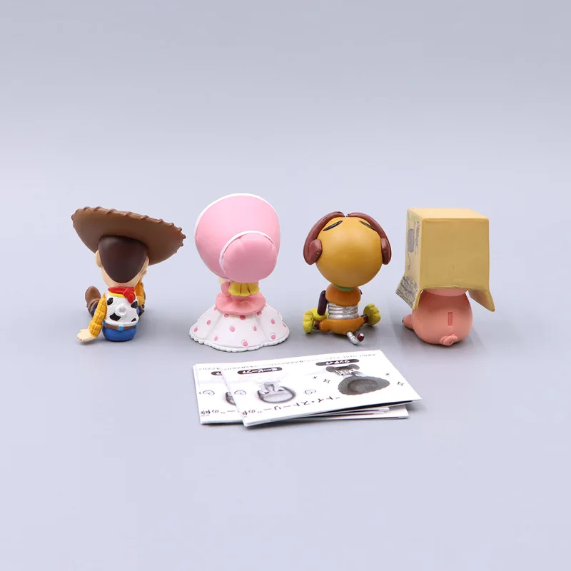 4 ชิ้น/เซ็ตอะนิเมะ Toy Story ซ่อนและค้นหาเครื่องประดับ Woody Slinky สุนัข Bo Peep Action Figure เดสก์ท็อปชุดตกแต่งของขวัญ