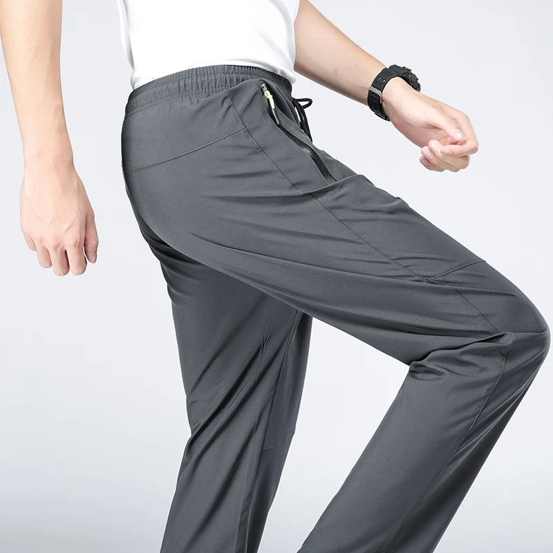 

Summer Outdoor Sports Pants Quick Dry Gym Fitness Sweatpants Hiking Camping Pants Men Women Climbing Running Trousers Men XL-5XL