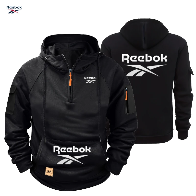 Sudadera con Capucha Reebok para Hombre, Colección Invierno-Primavera 2026 - Sudadera Deportiva Holgada con Cremallera, Manga Larga, Múltiples Bolsillos - Cómoda para el Día a Día