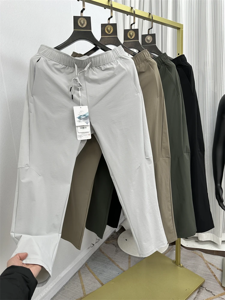 

Мужские тонкие брюки из ледяного шелка с лазерной перфорацией, быстросохнущие, дышащие, приятные для кожи, простые, универсальные, с охлаждающим эффектом, повседневные, спортивные, длинные.