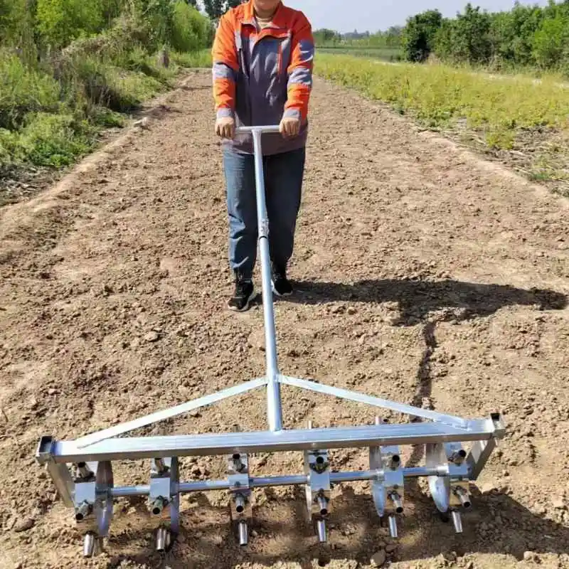 Professional garlic and onion planting tools with adjustable row spacing and 12.5 cm plant spacing for efficient field planting