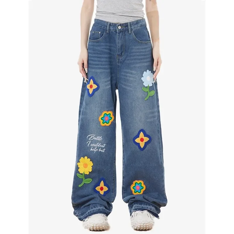 American creative letter embroidered petal jeans female autumn new retro loose slim high waist Joker mop leg pants.