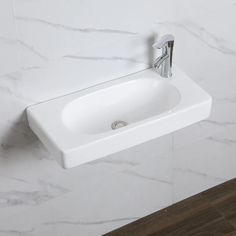 Schmales rechteckiges Waschbecken zur Wandmontage für kleine Wohnungen. Kleines Badezimmer-Haushaltswaschbecken aus Keramik. Balkon-Ecke-Einzelwaschbecken