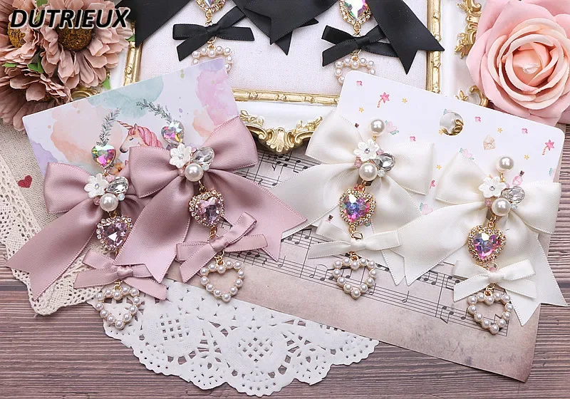 

Lolita Butterfly Earrings Girls Japanese Style Sweet and Cute Earrings Women Fashion Bow Rhinestone Love Pearl Earrings Female