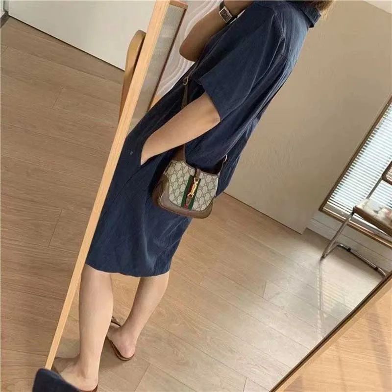 Mode Revers Knopf Taschen einfarbig Freizeit kleider Damen bekleidung Frühling Sommer neue übergroße All-Match-Midi-Kleid