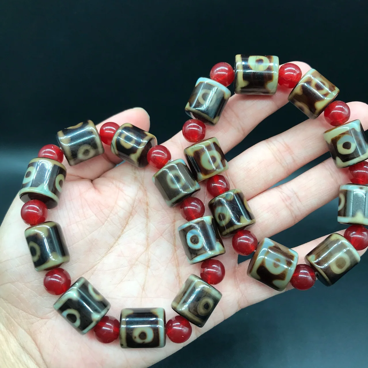 

Natural three-eye Tibetan God Bead Bracelet Agate God Bead Three-eye bracelet bucket beads with jewelry.