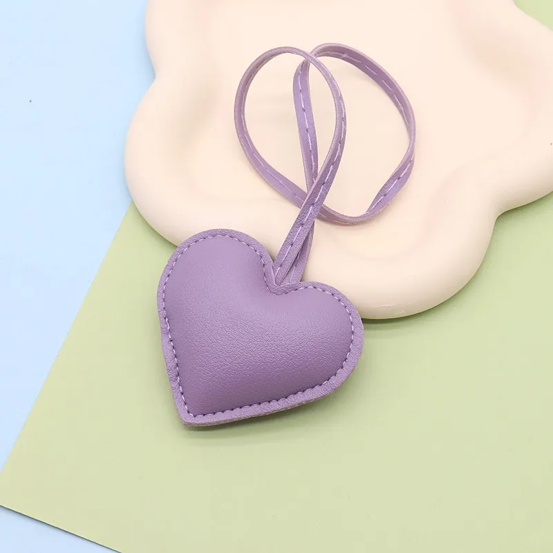 المفاتيح الجلدية مفتاح فوب حقيبة سحر 7*6 سنتيمتر مجوهرات للنساء مفاتيح على ظهره