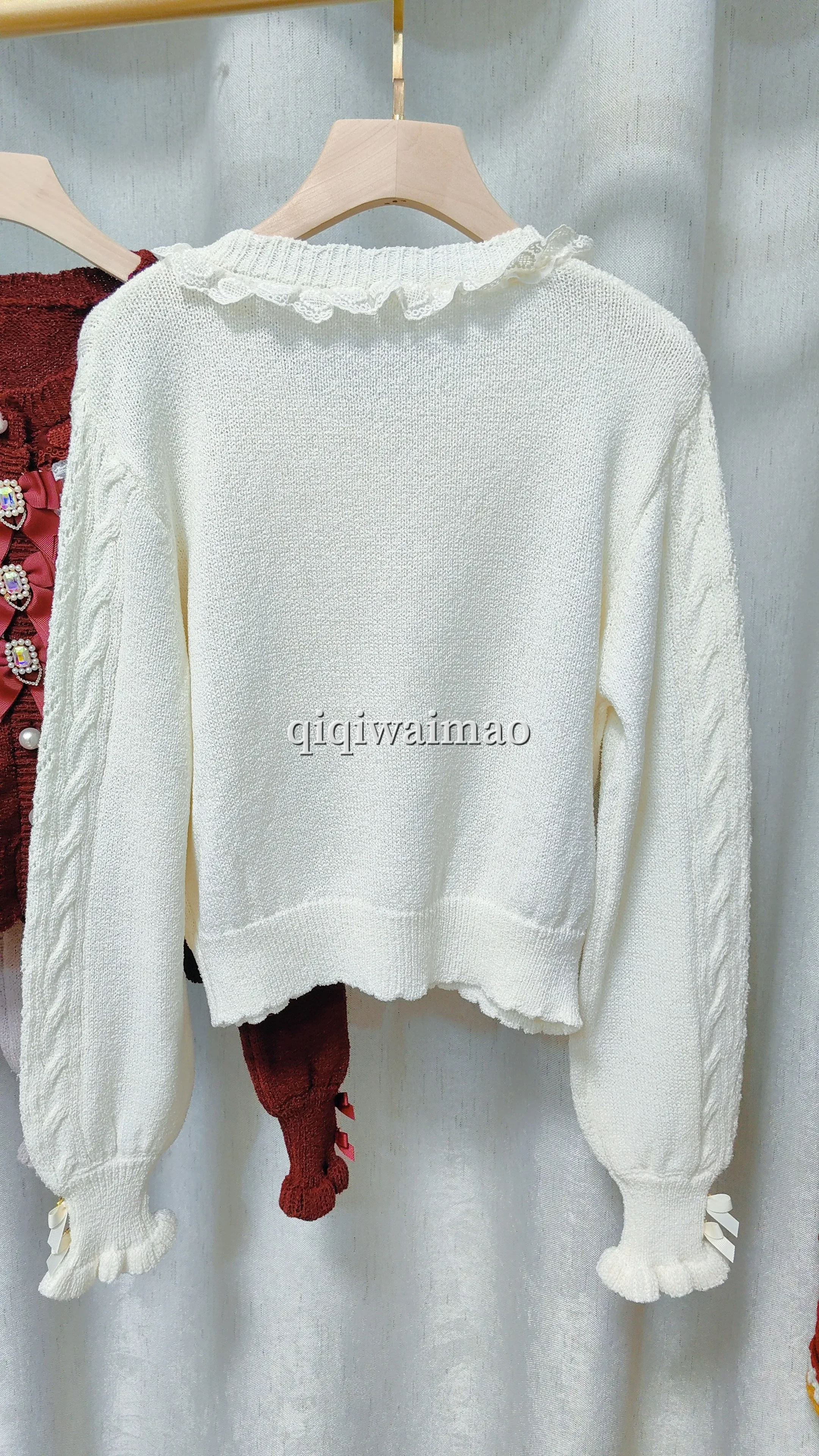 Primavera e autunno nuove ragazze dolci cardigan corto lavorato a maglia miniera cravatta fiocco in pizzo scavato girocollo maglione con fibbia di perle
